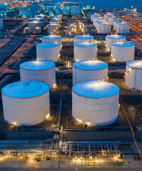 Aerial view oil and gas terminal storage tank farm,Tank farm storage chemical petroleum petrochemical refinery product, Business commercial trade fuel and energy transport by tanker vessel.